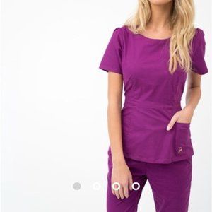 Jaanuu Peplum Scrub Top